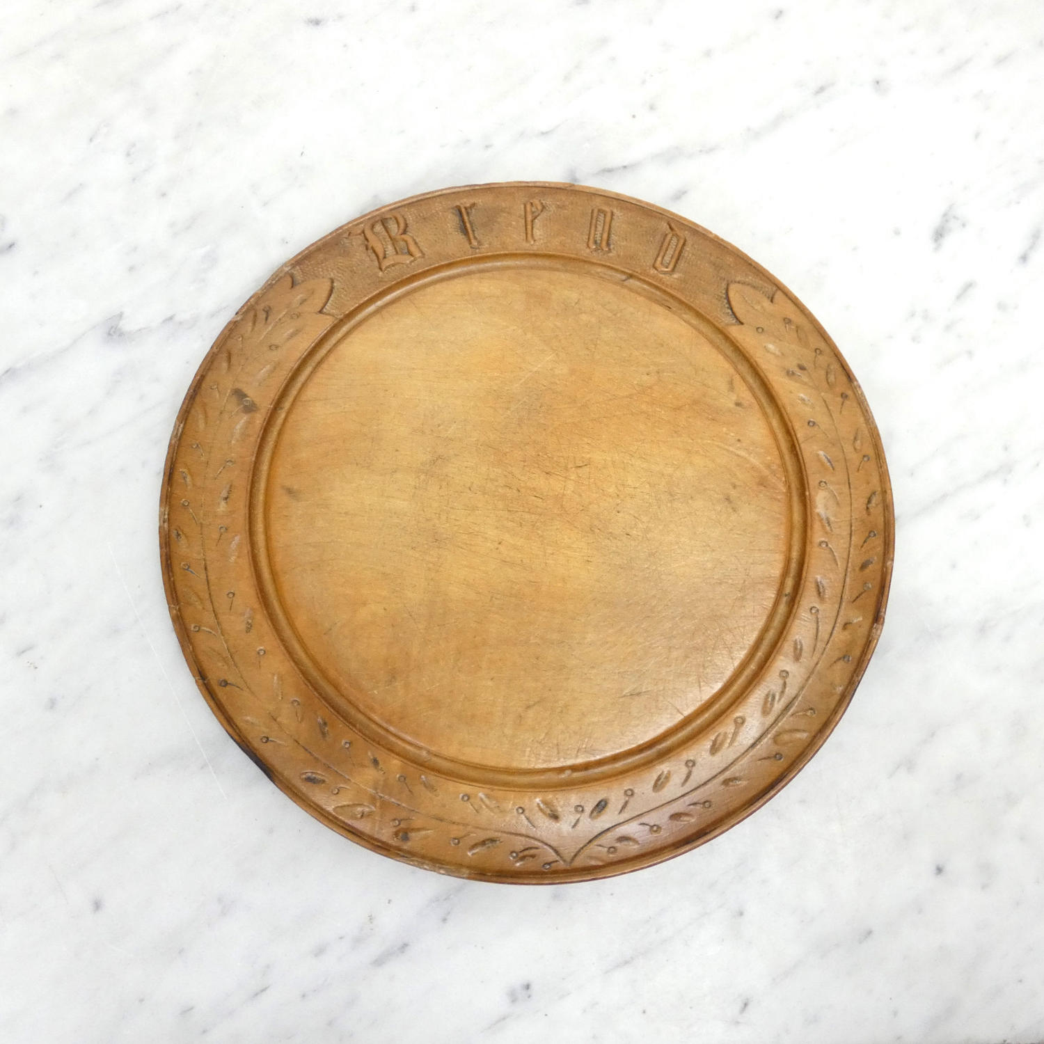 Antique chip carved breadboard