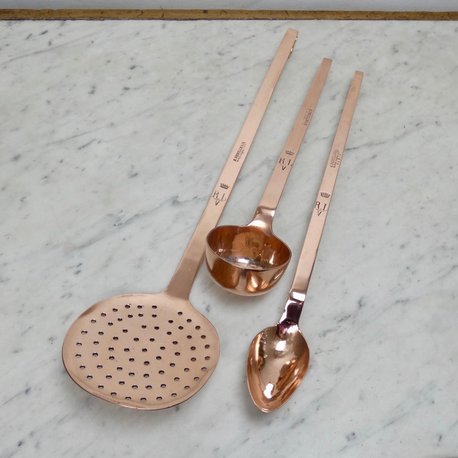 Crested kitchen utensils.