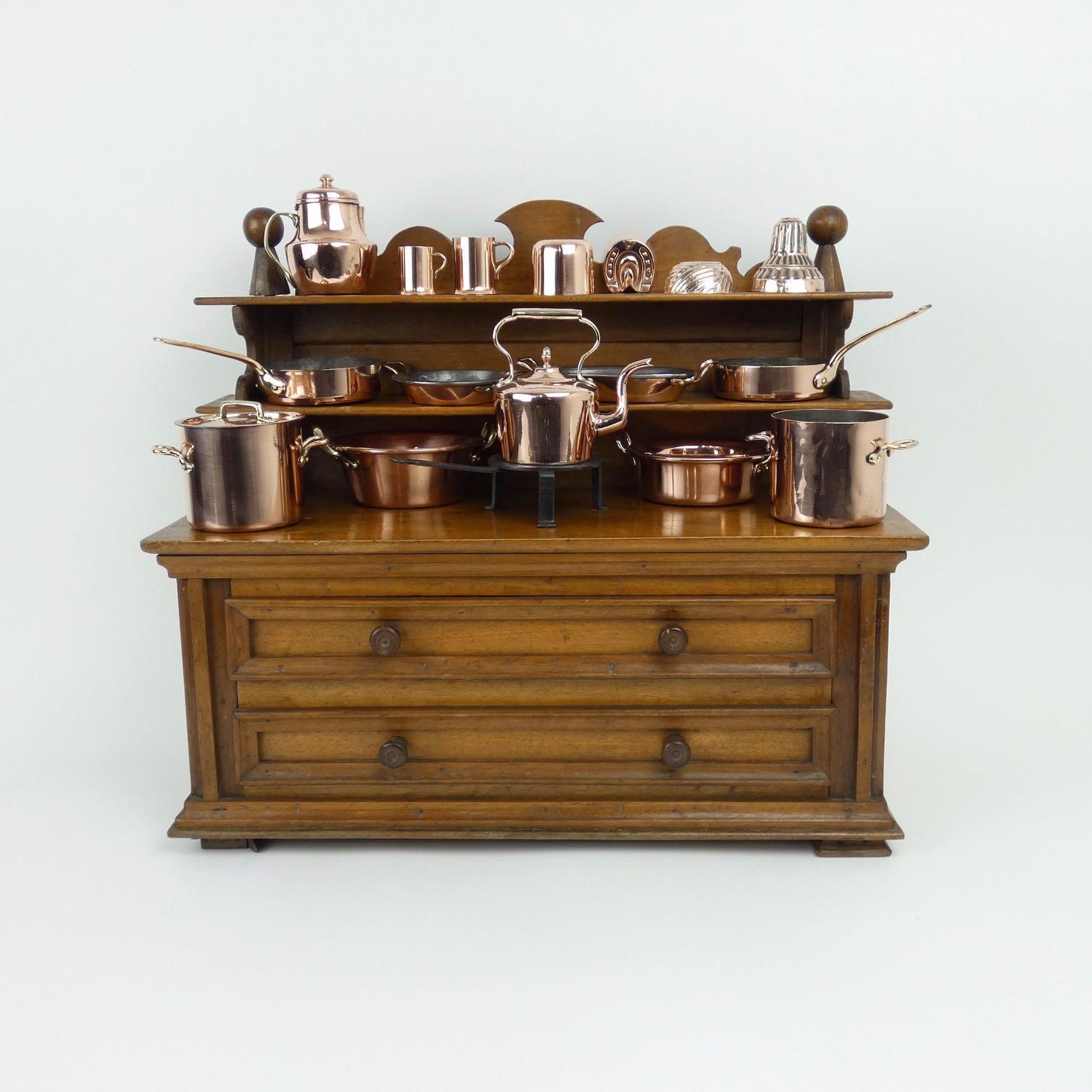 Miniature walnut dresser with copperware