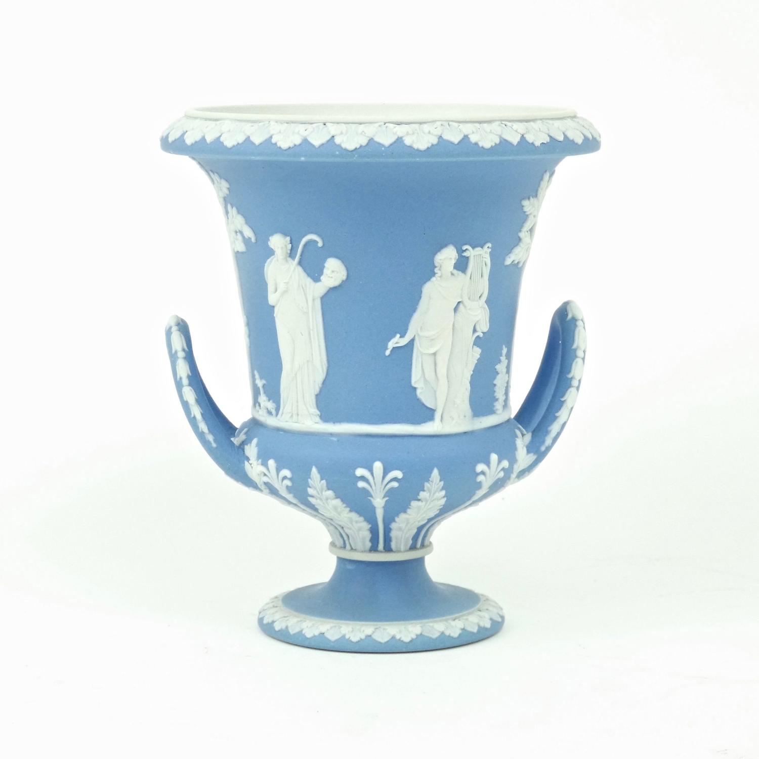 Pale blue campana vase.