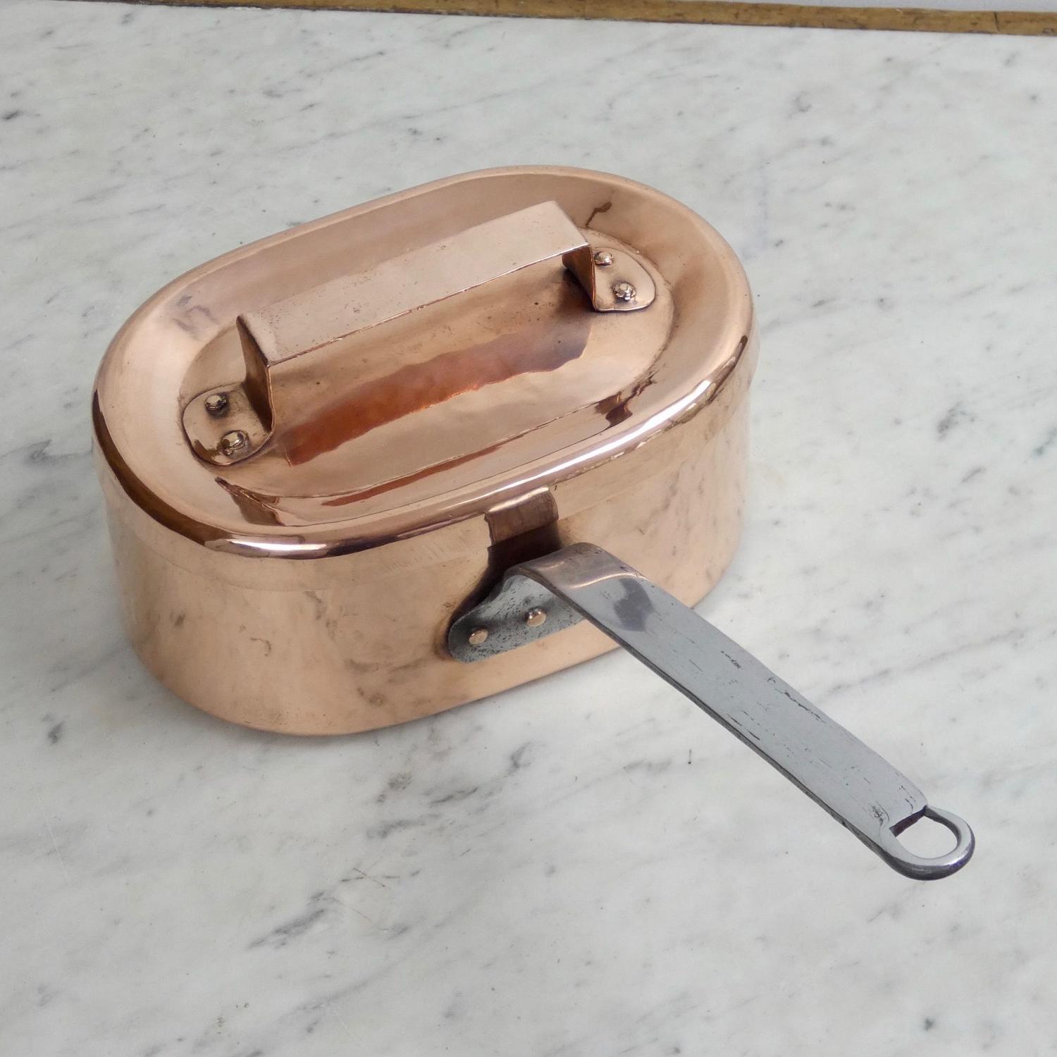 Oval copper saucepan