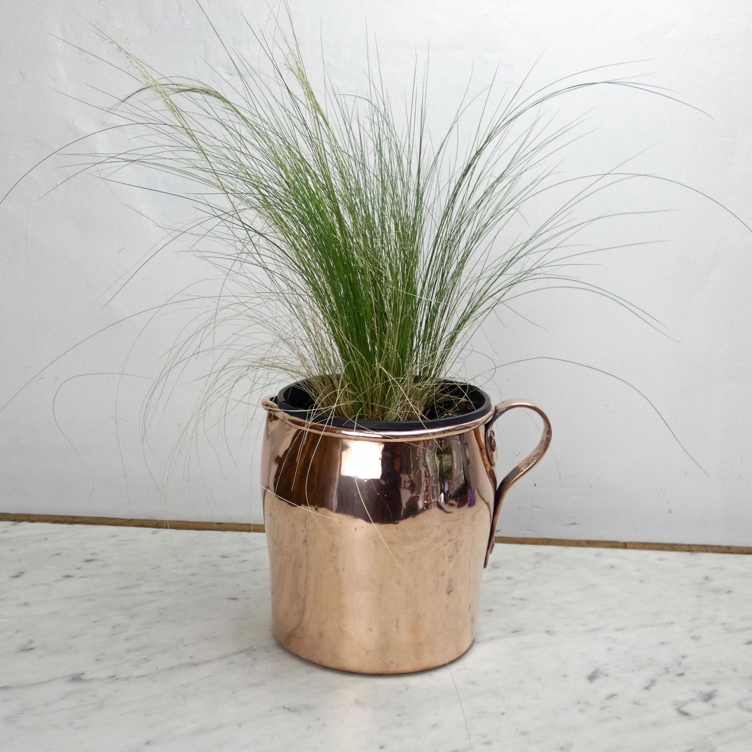 Unusual shaped copper jug