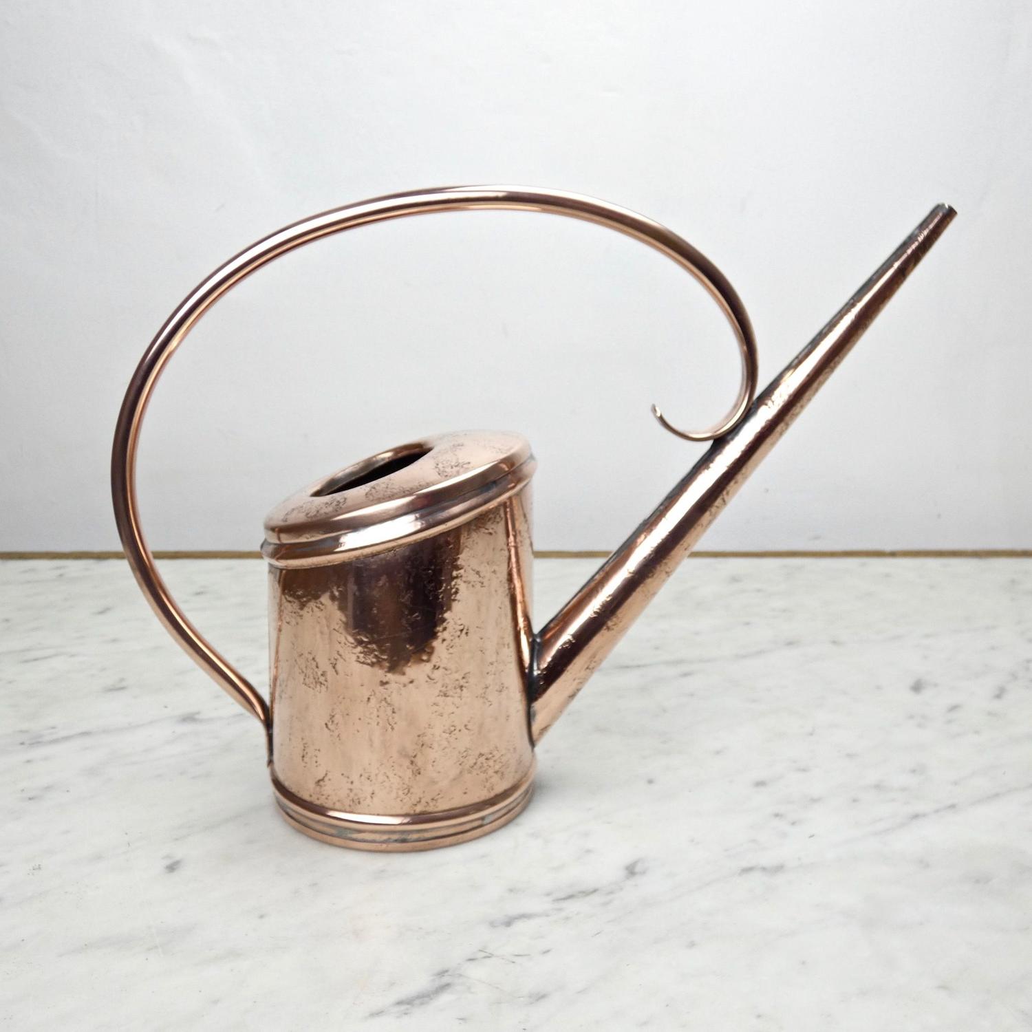 Small copper watering can