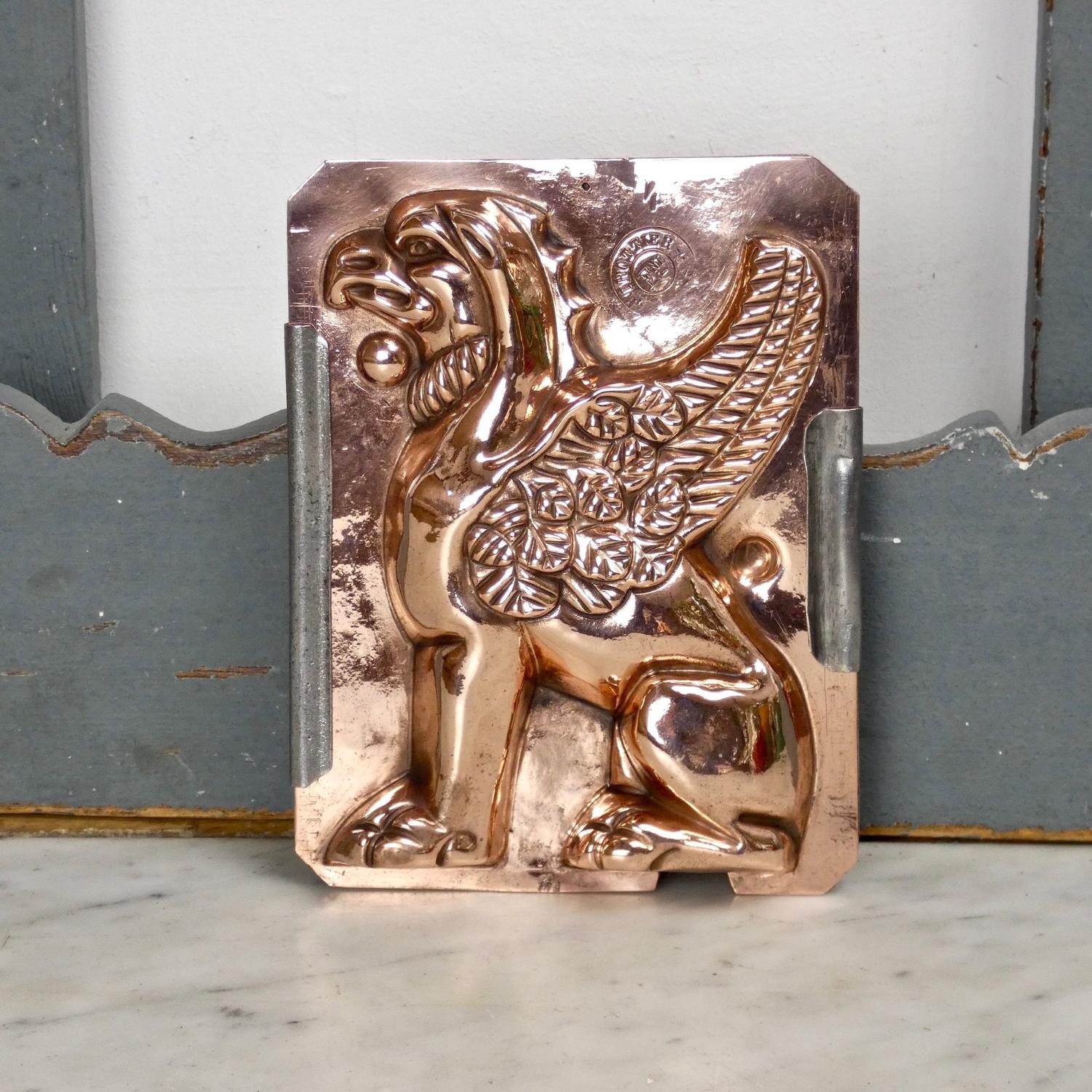 Two part copper mould of a griffin