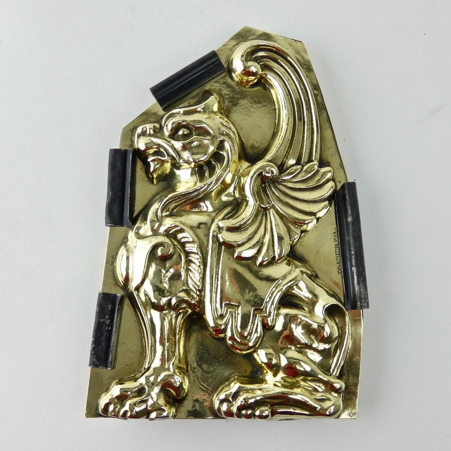 Brass mould in the shape of a griffin