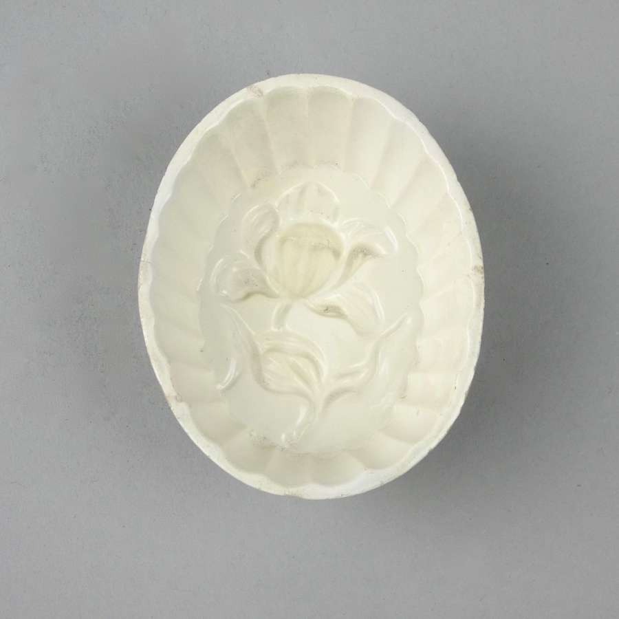 Creamware mould of orchid