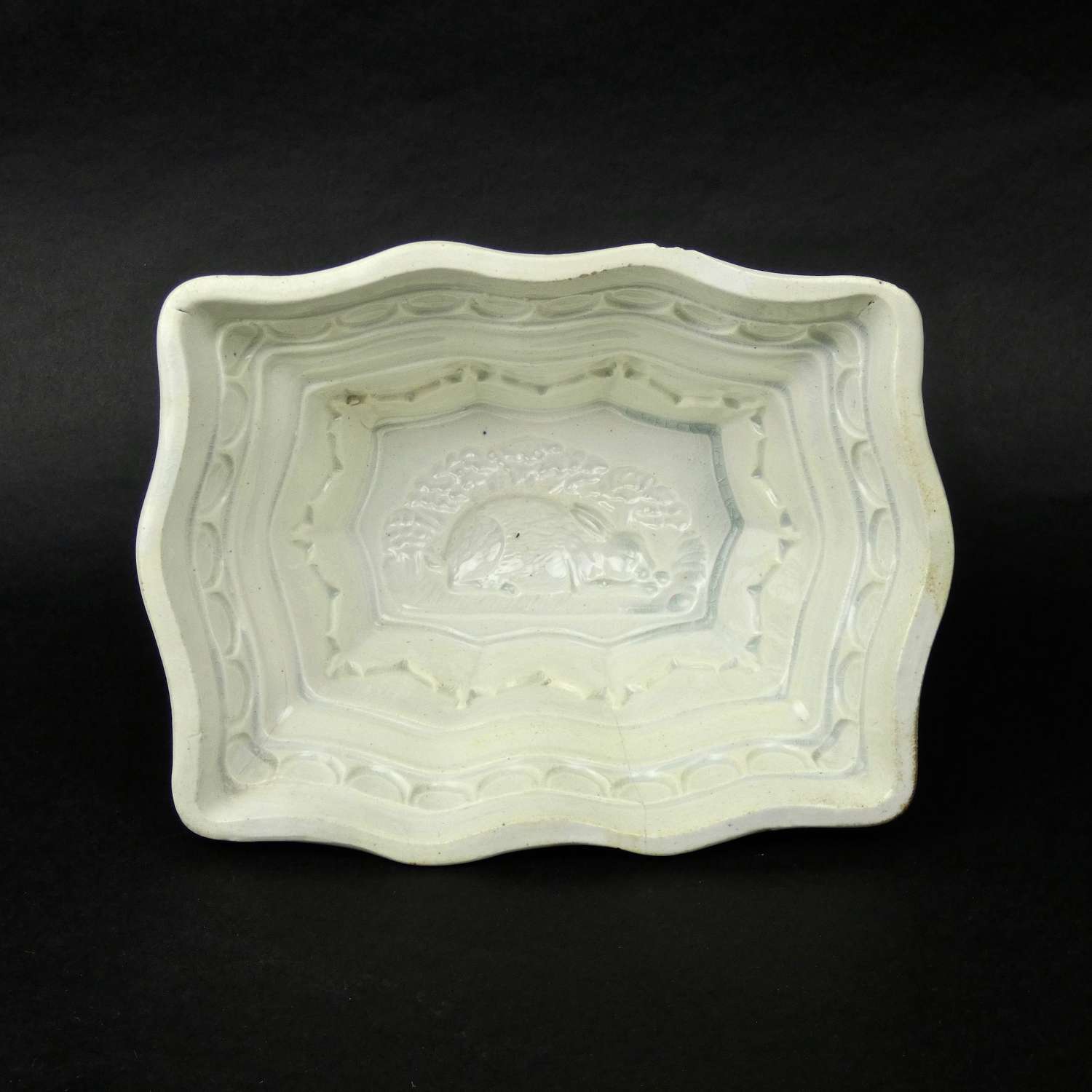 Earthenware mould with rabbit in base