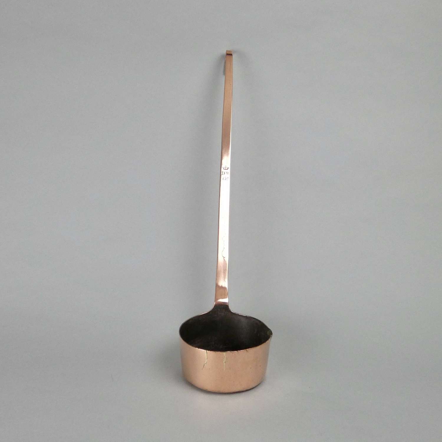 Copper ladle with engraved crest