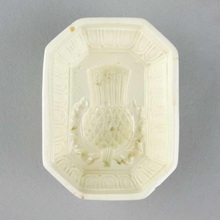 Creamware mould with thistle to base