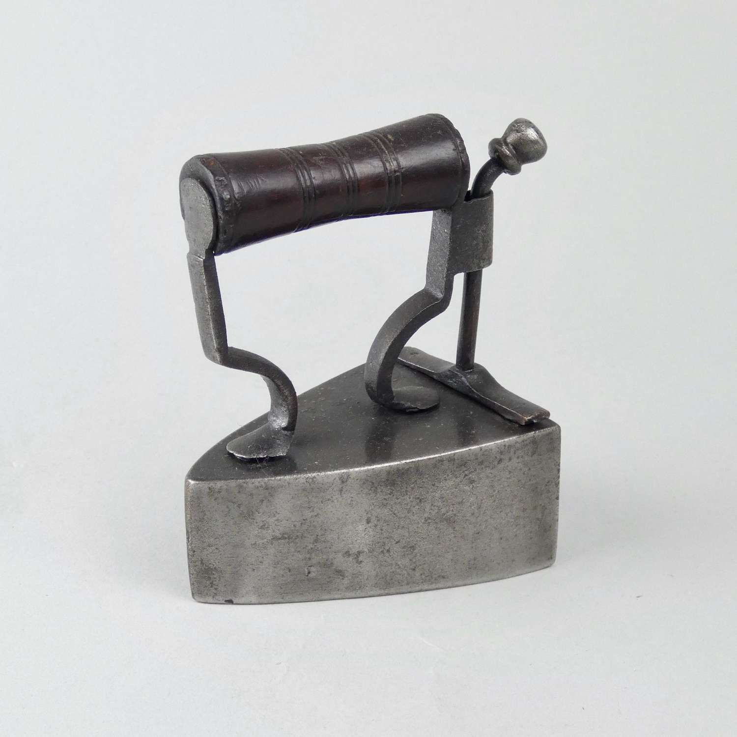 Small box iron by 'J BATES'