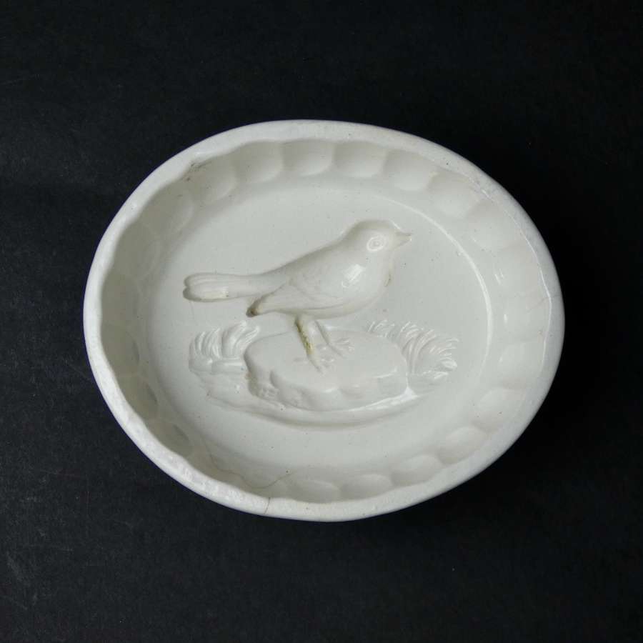 Wedgwood mould with robin to base