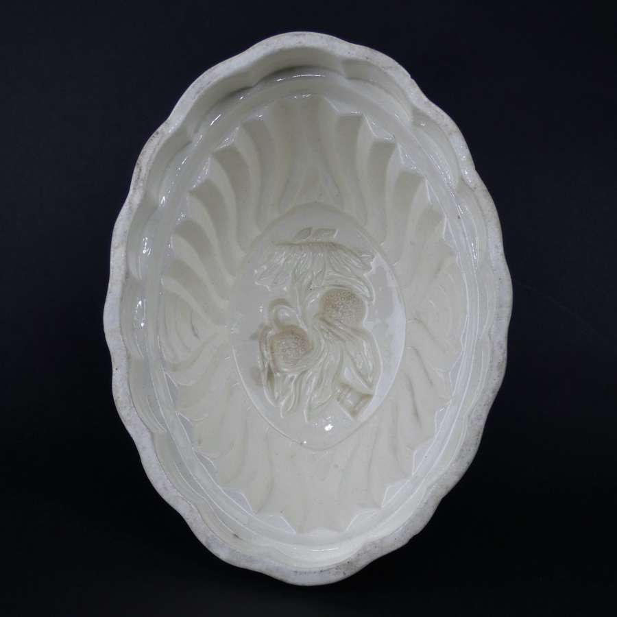 Creamware mould with exotic fruits