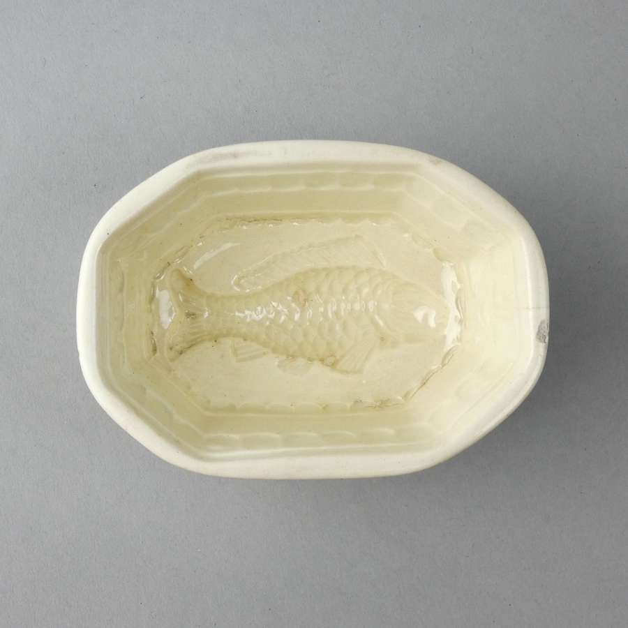 Earthenware mould with fish