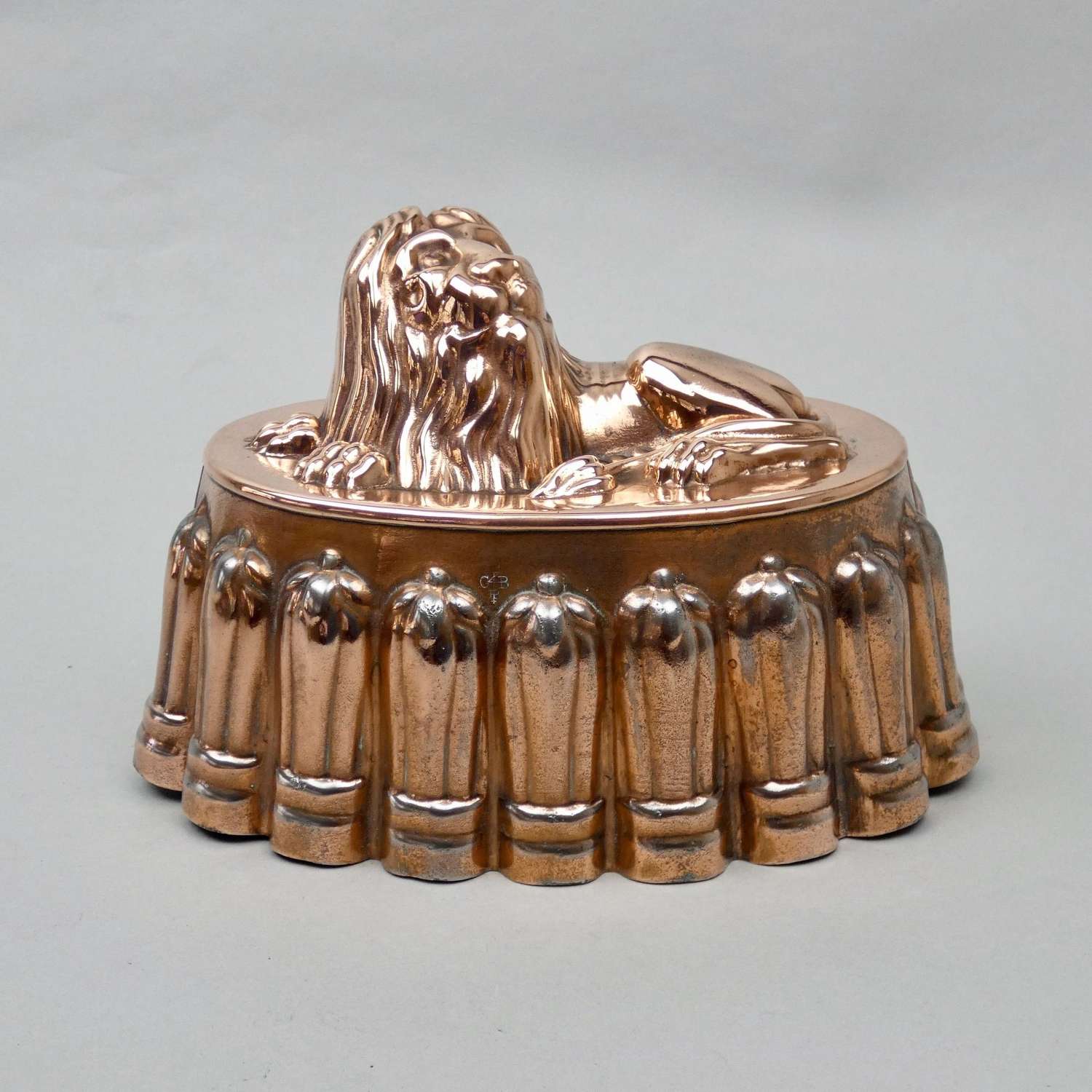 Tin mould with copper lion top