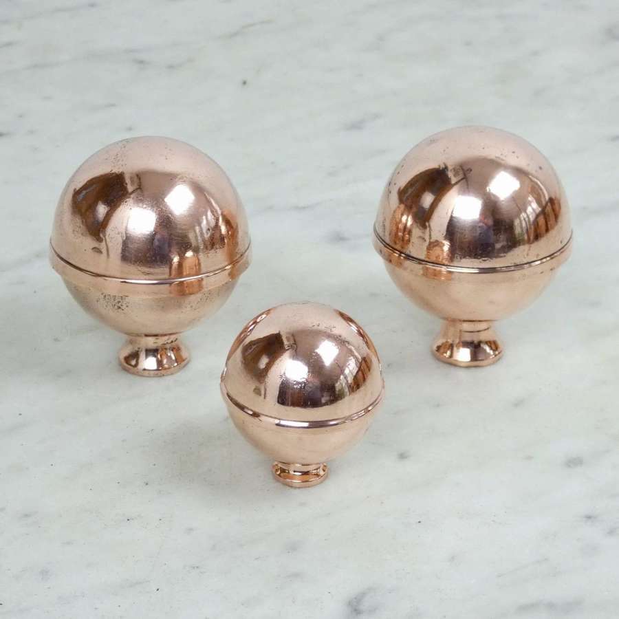 Small, spherical copper moulds