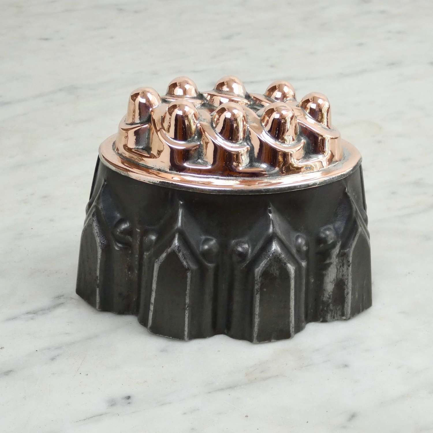 Geometric, copper and tin mould