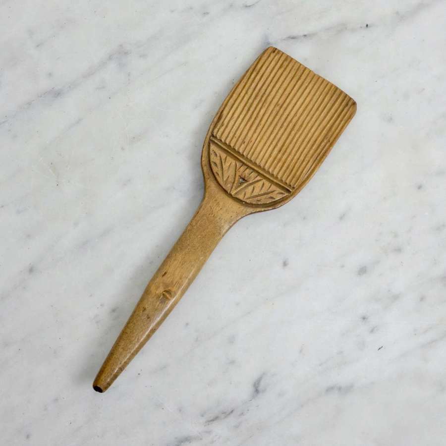 Carved sycamore butter curler