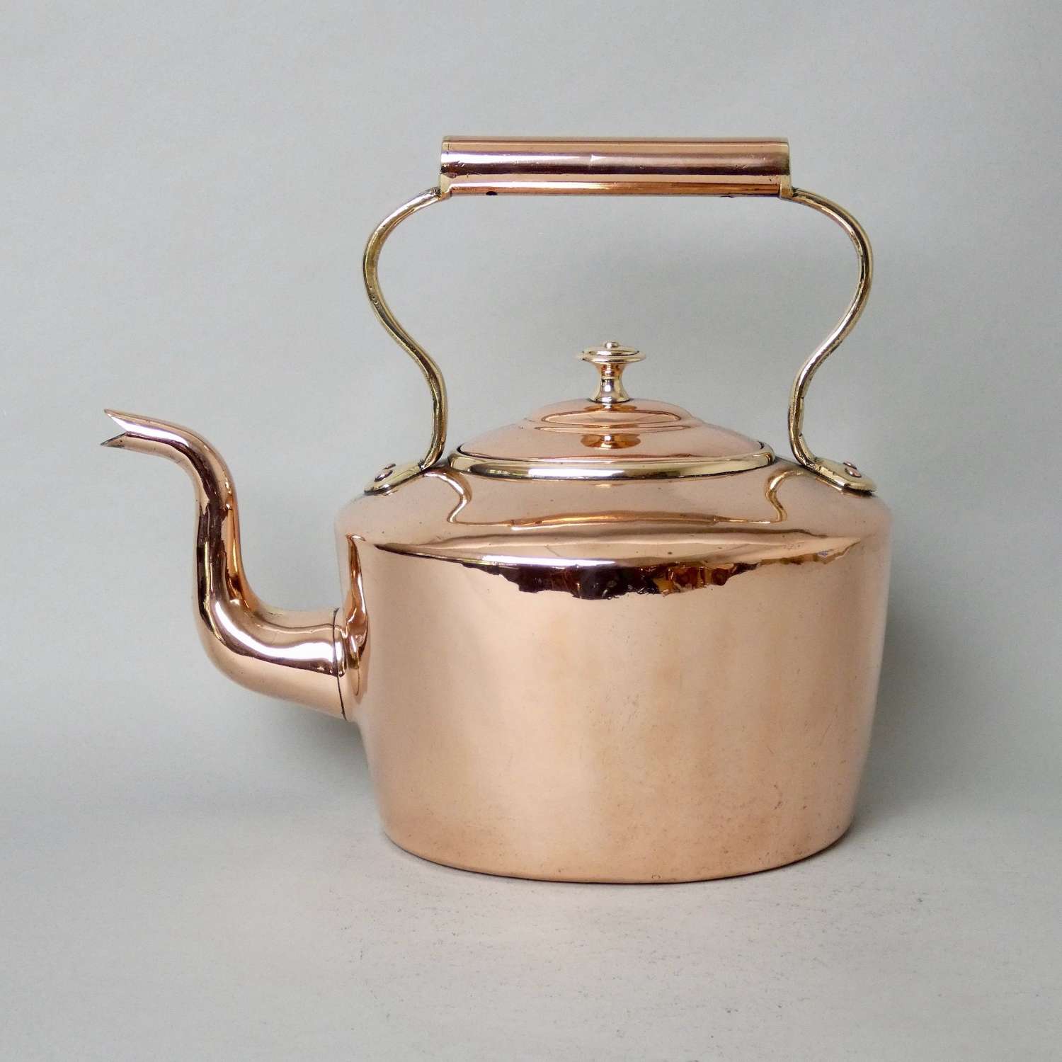 Small, oval copper kettle