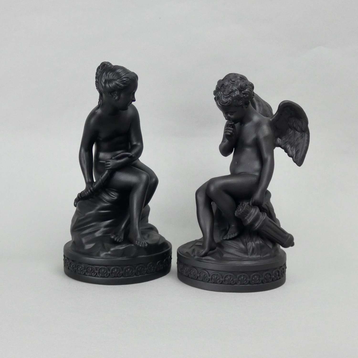Pair of Wedgwood basalt figures of Cupid & Psyche