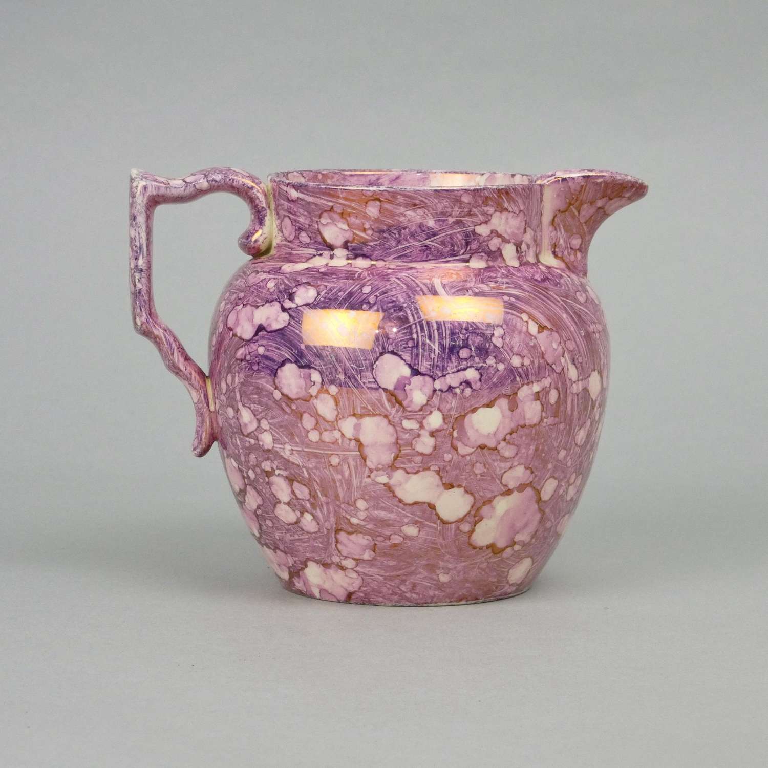 Early 19th century, pink splash lustre jug.