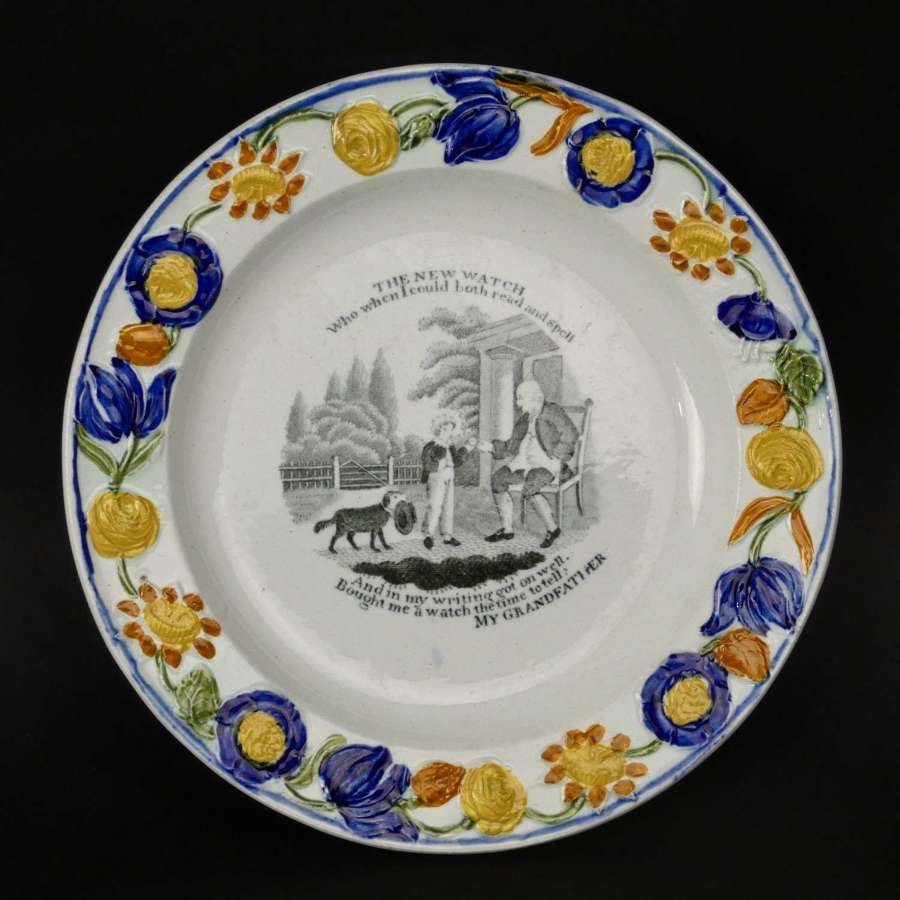 Child's plate with black print 