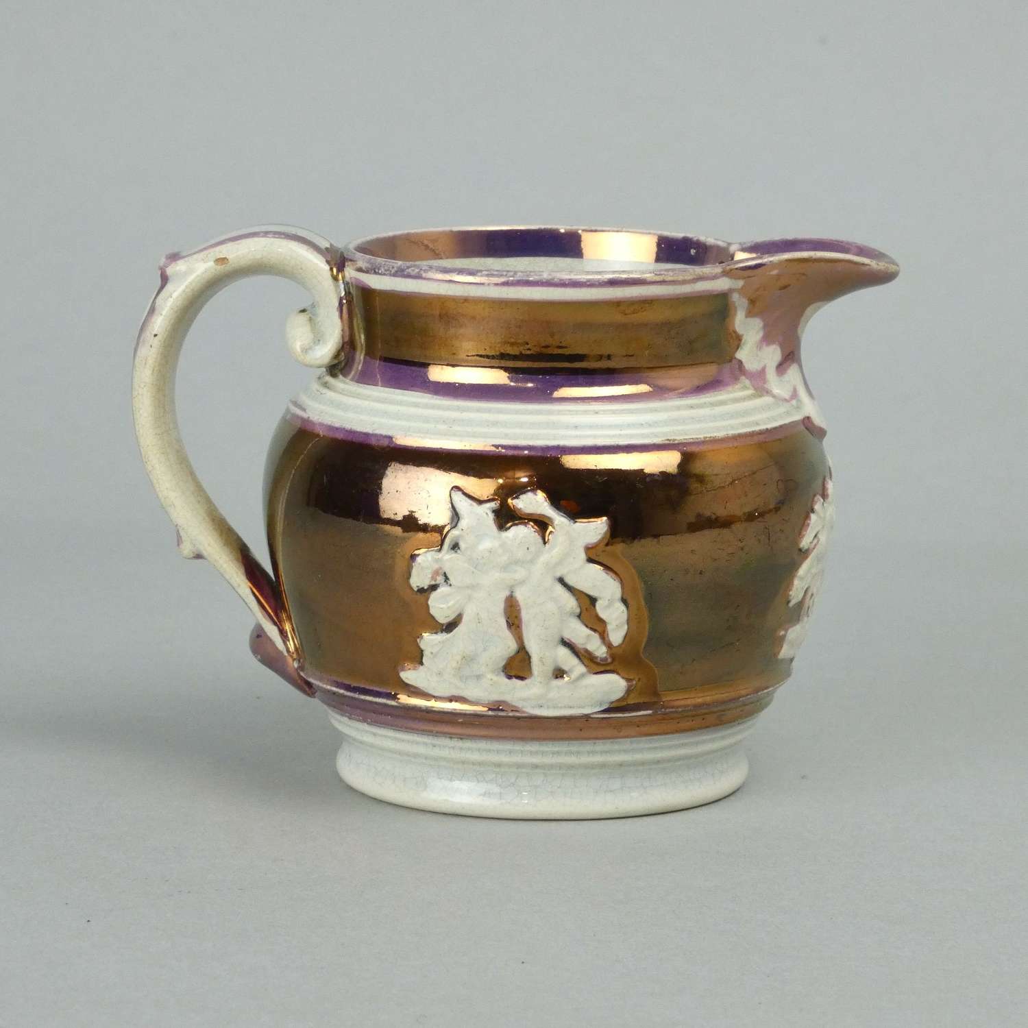 Small, copper and pink lustre jug