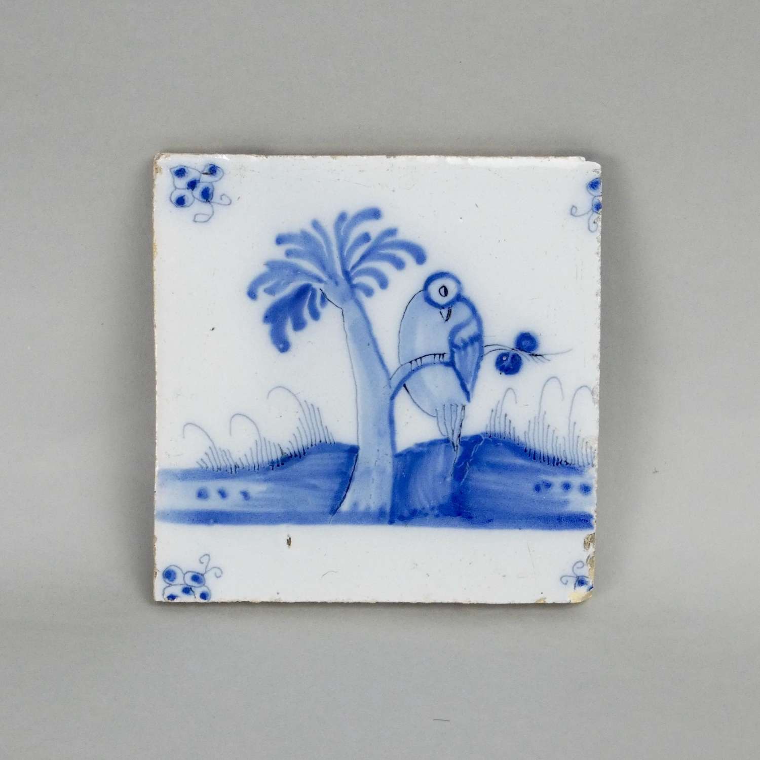 Delft tile painted with a bird