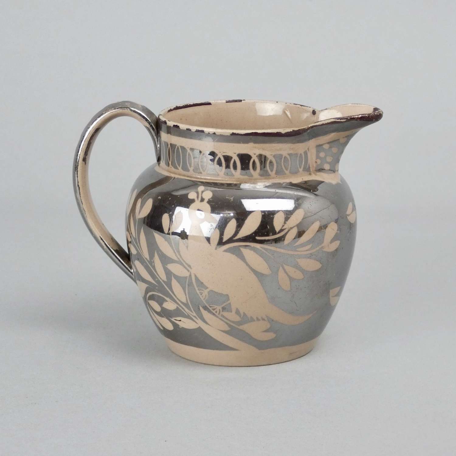 Small, silver lustre jug