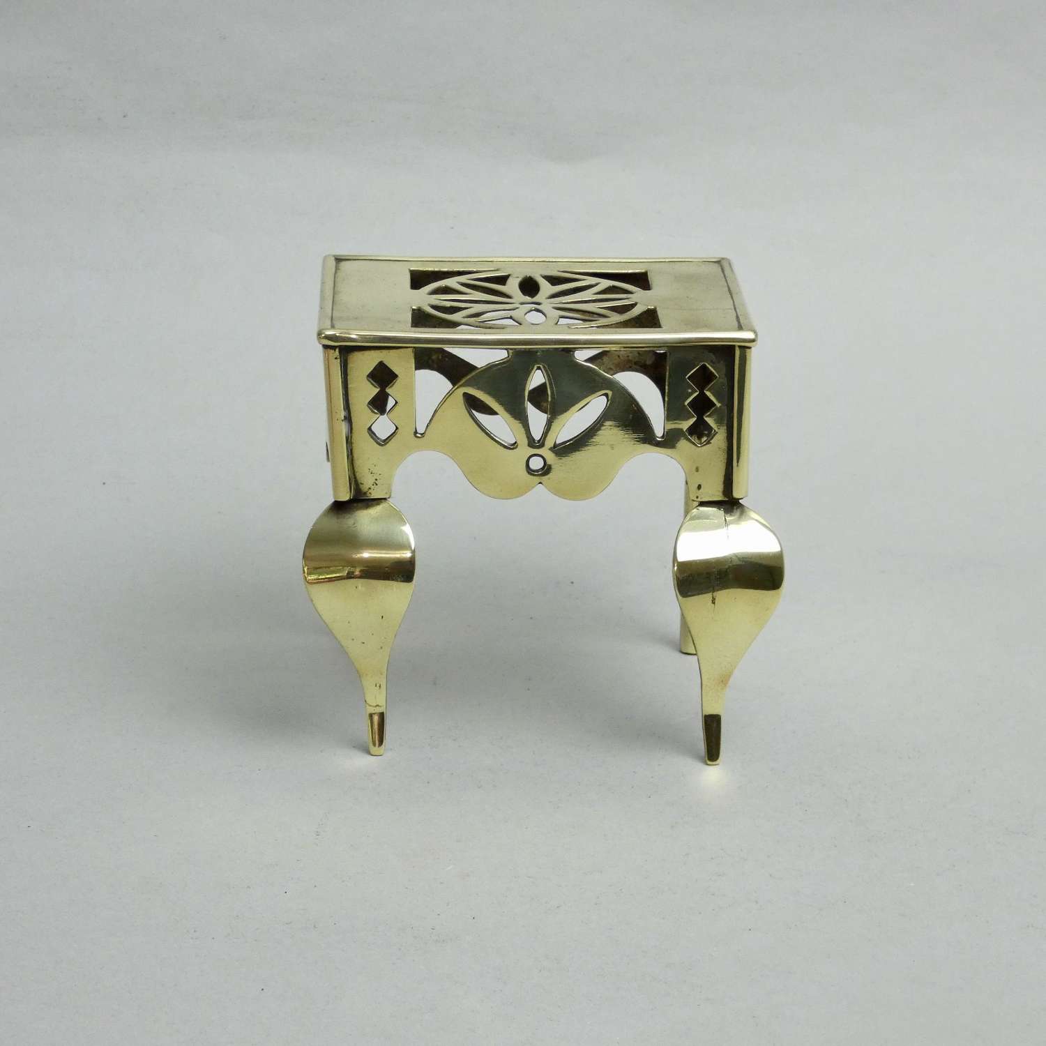 Miniature brass footman