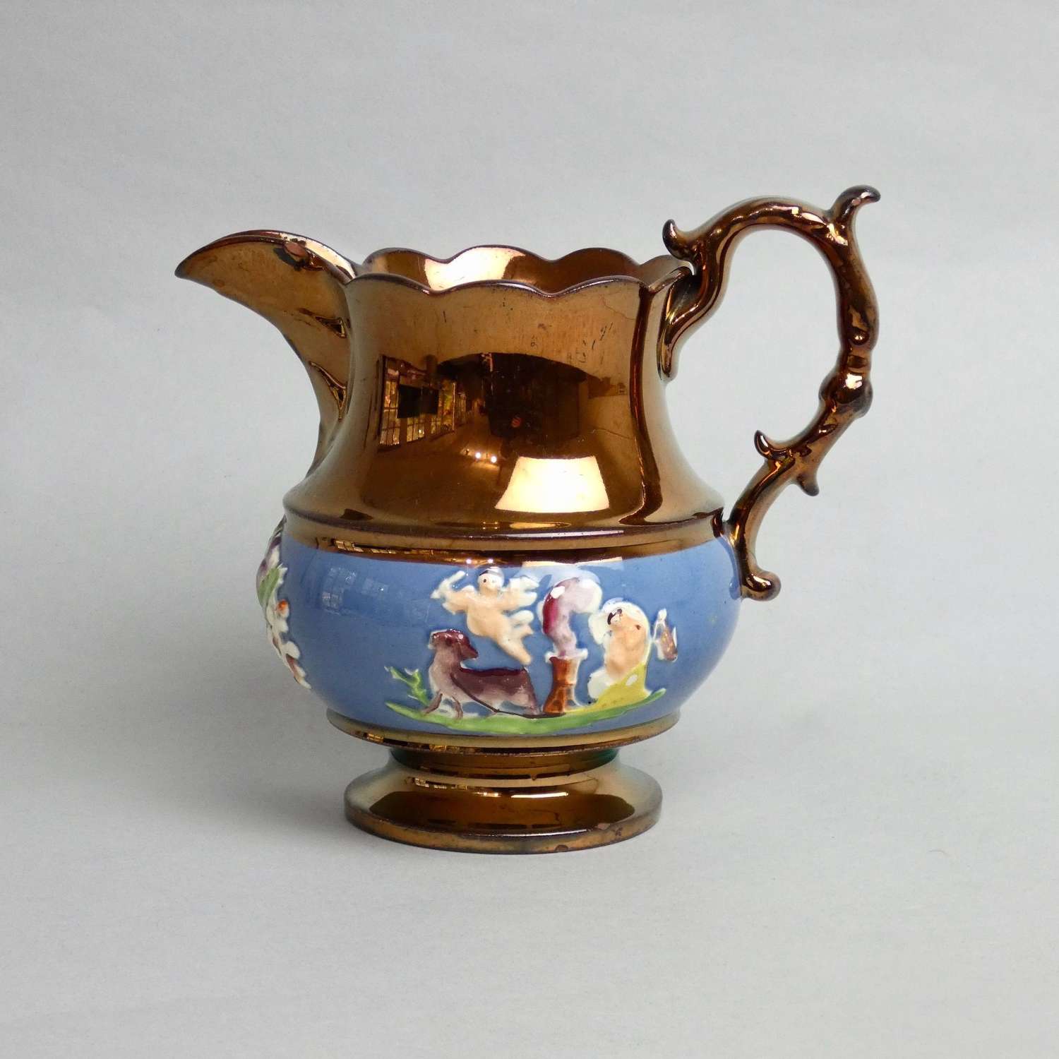 Moulded copper lustre jug