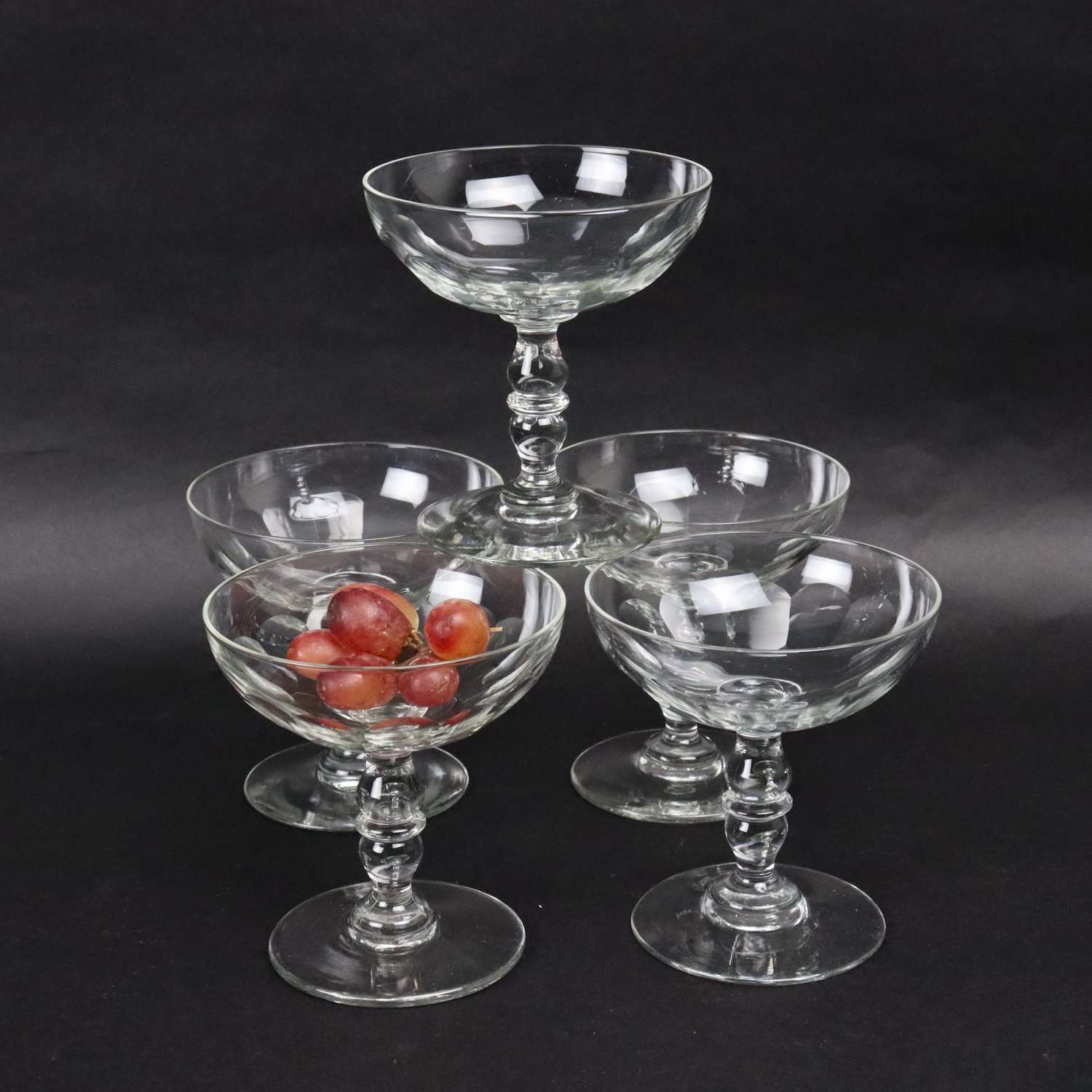 Five French crystal champagne coupes
