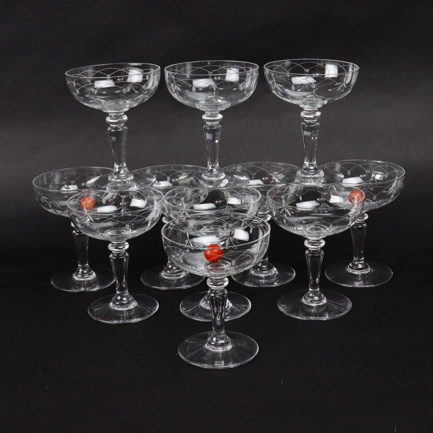 11 engraved, crystal champagne coupes