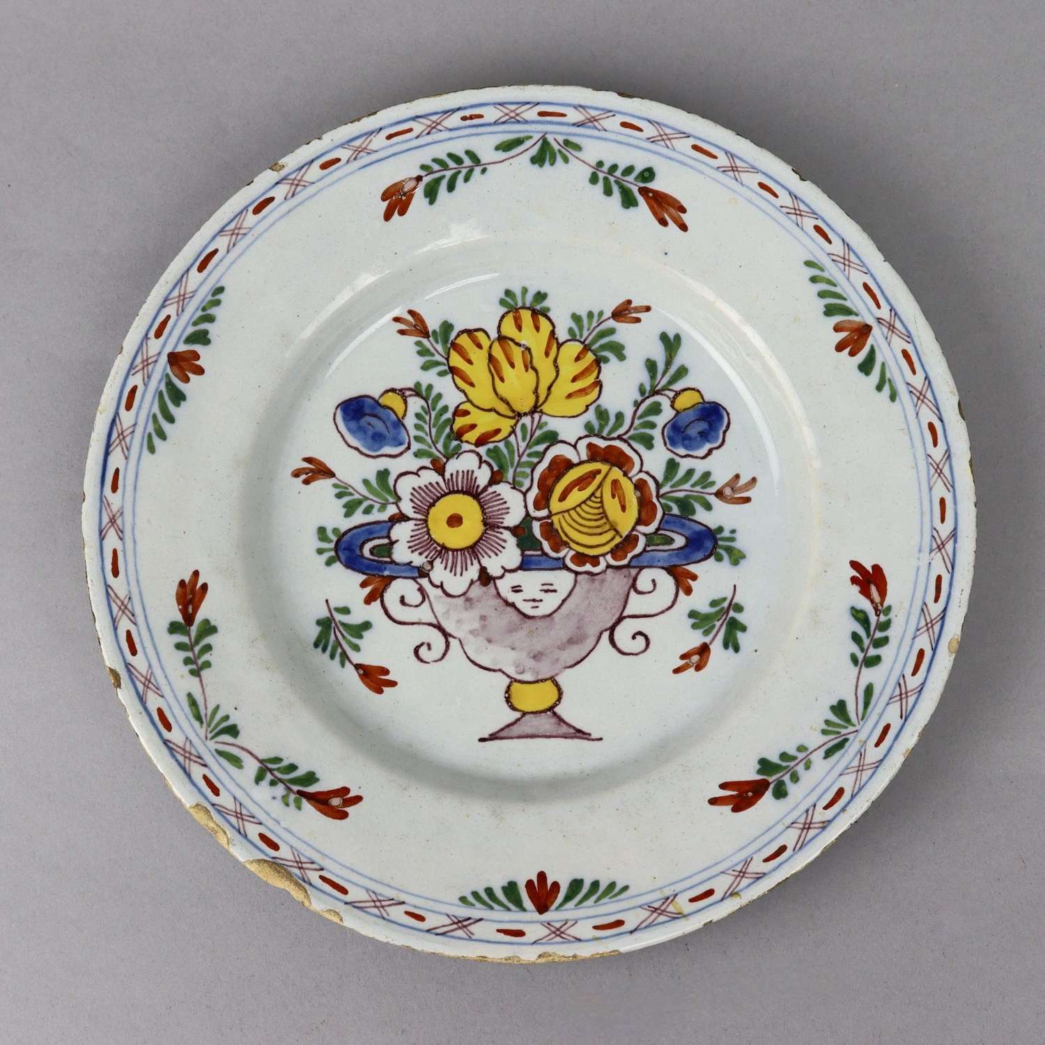 Delft Plate Painted with a Vase of Flowers