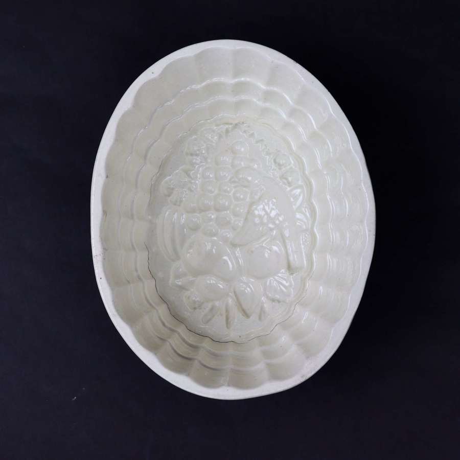 Creamware Mould with Bird Eating Fruit
