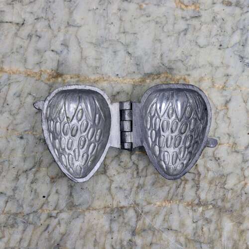 Small Pewter Mould in the Shape of a Strawberry