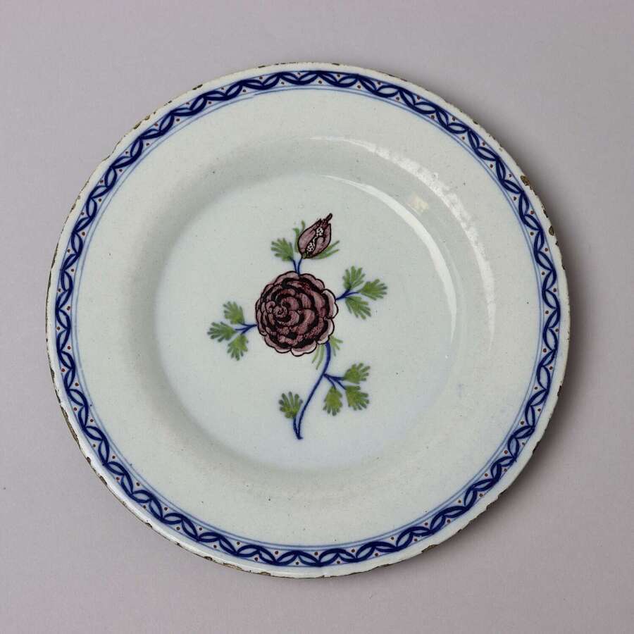 Polychrome Dutch Delft Plate Decorated with a Chrysanthemum